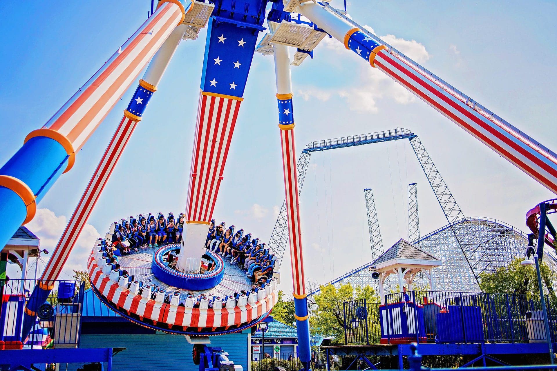 Guests on the revolution ride at Six Flags Great America, one of the best kids activities near Chicago.