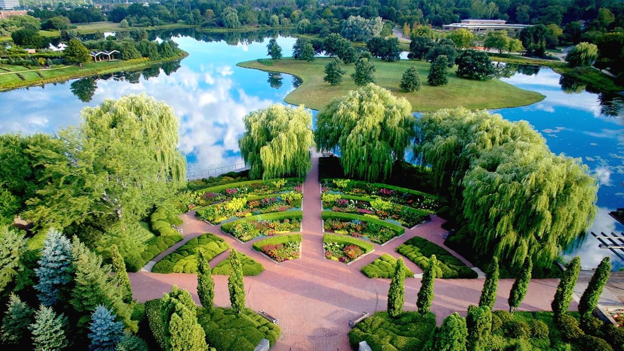 An aerial view of a small garden along the water at Chicago Botanic Garden, one of the best kids activities in Chicago.
