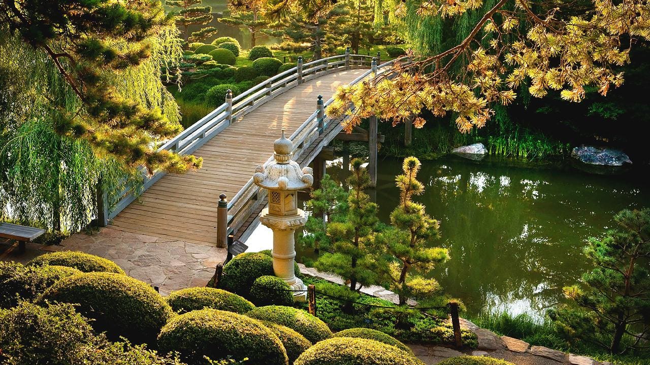 A bridge over the water in the Japanese Garden at Chicago Botanic Garden.