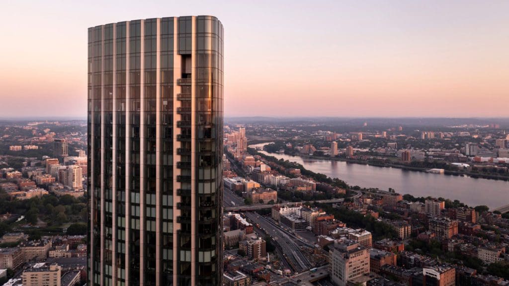 A view of Four Seasons Hotel Washington, DC at dusk, one of the best spa getaways near DC for moms.