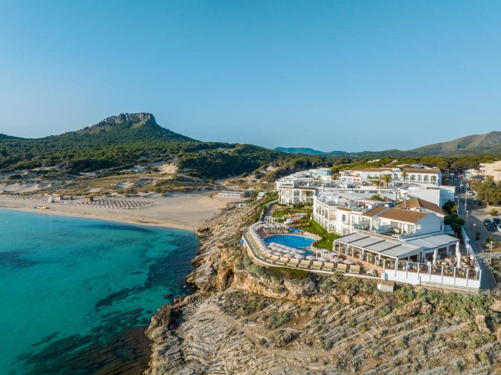 VIVA Cala Mesquida Resort & Spa set about the sea on rocky cliffs.