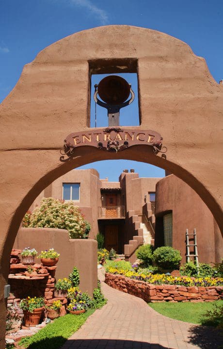 The entrance arch to Adobe Grand Villas.