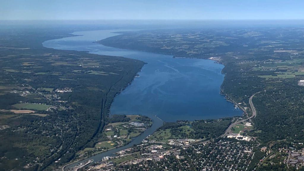 An aerial view of Cayuga Lake, one of the best places to stop on an NYC to Niagara Falls itinerary for families. 