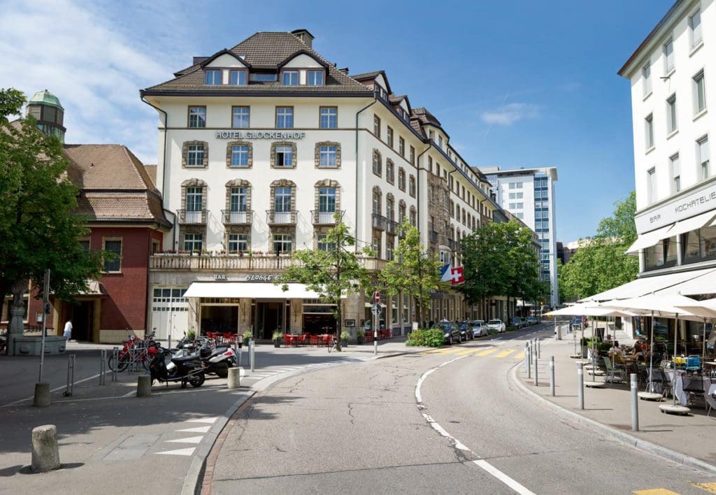 The exterior of Hotel Glockenhof, nestled along a street in the Old Town.