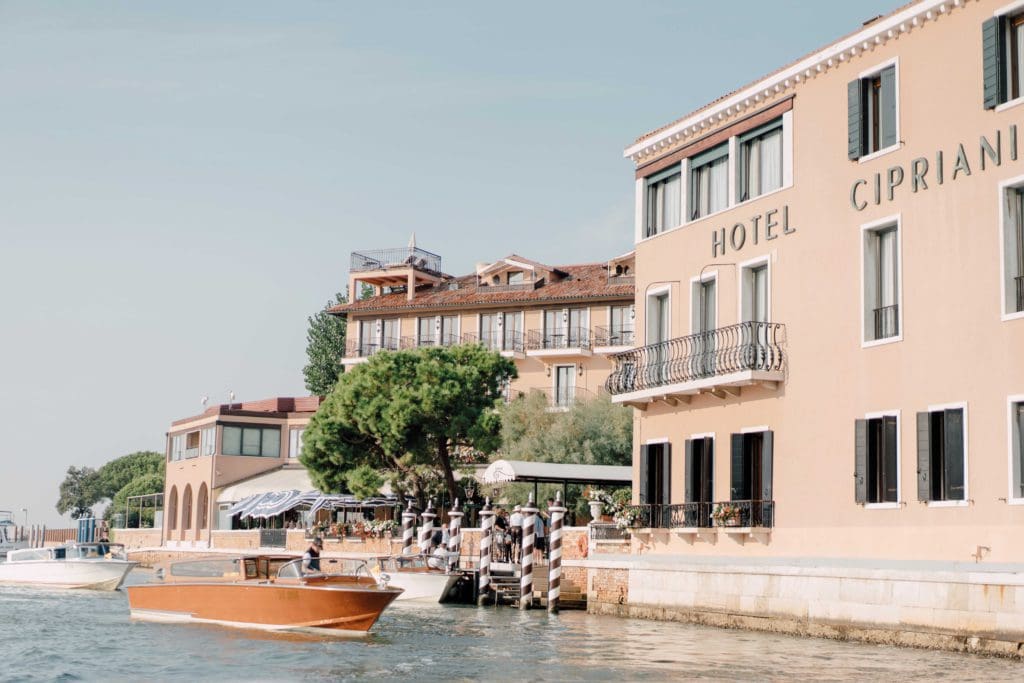 The entrance to Hotel Cipriani, A Belmond Hotel, Venice, along a canal, one of the best hotels in Venice for families.