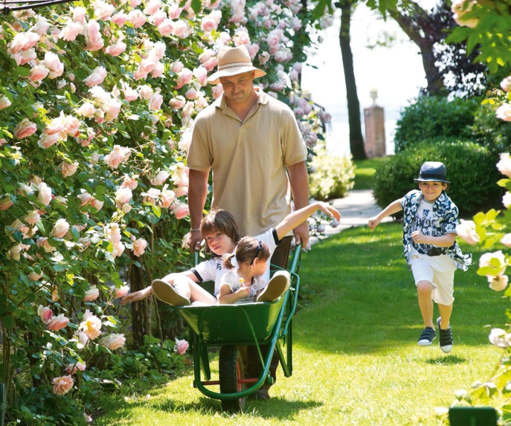 A gardener shows kids the gardens at Hotel Cipriani, A Belmond Hotel, Venice.