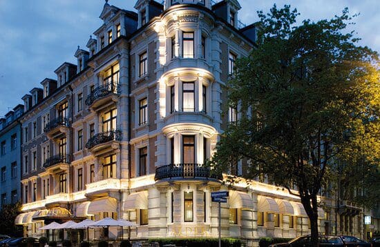 The exterior entrance to Alden Suite Hotel Splügenschloss Zurich.