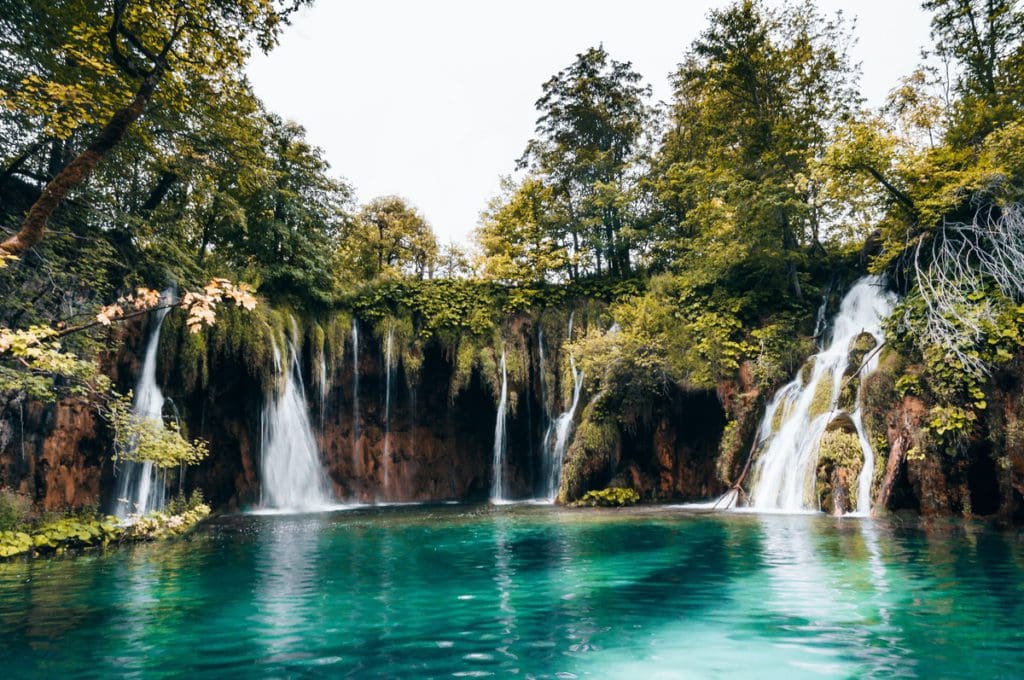 A view of the iconic waterfalls at Plitvice National Park near Zadar, one of the best places to visit in Croatia with kids this summer.