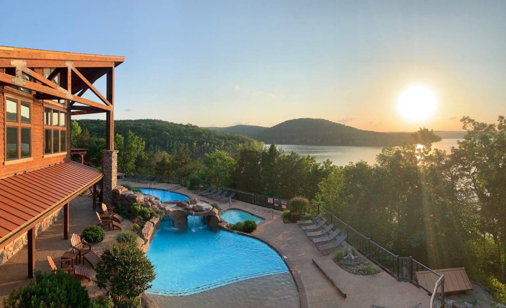 The outdoor pool overlooking the Ozark Mountains at Stonewater Cove, one of the best Moms Weekend Getaways in the Midwest.