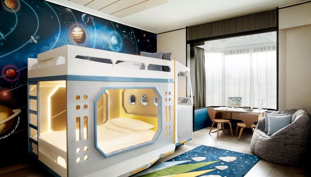 Inside one of the themed suites for families, decorated like space, at Shangri-La Singapore.