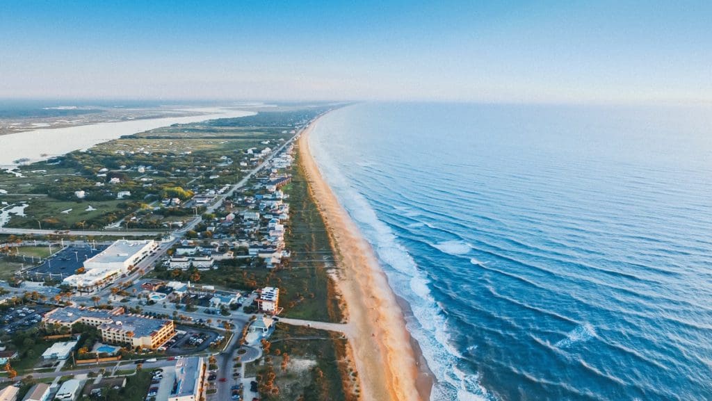 An aerial view of St. Augustine along the beach, one of the best places to travel with your mom.