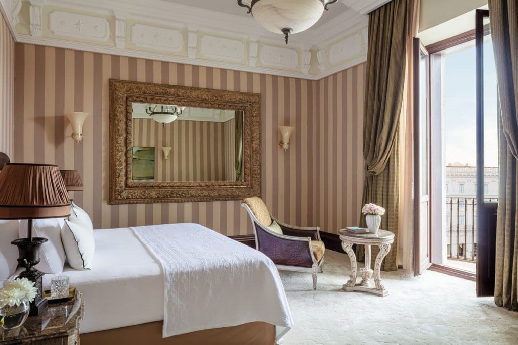 Inside one of the luxury Junior Suites at Anantara Palazzo Naiadi Rome Hotel.