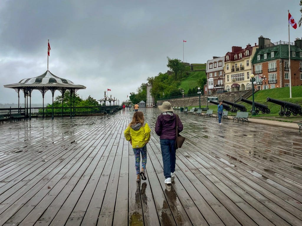 A woman and her grandmother walk along the boardwalk in Dufferin Terrace.