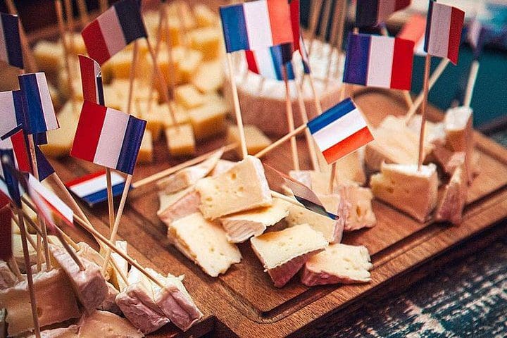 A plate of cheese, best enjoyed on the .Montmartre Walking Tour: Paris’ Best Art, Culture, and Food