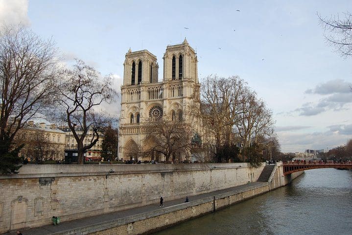 Notre Dame, as seen from the river on a Paris Private Day Tour & Seine Cruise for Kids and Families.