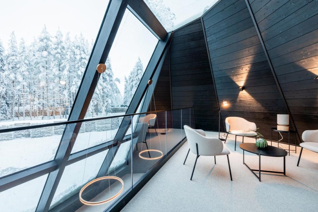 A living area with a great outdoor view of the snow at Glass Resort.