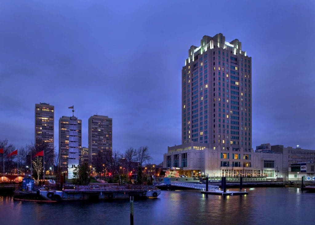 The exterior of Hilton Philadelphia at Penn's Landing at night.