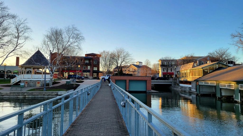 Genesee street as seen from Skaneateles lake pier in Skaneateles, New York, one of the best cute towns near NYC with kids.