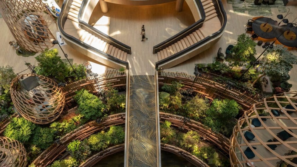 An aerial view of the skybridge within the lobby of PARKROYAL COLLECTION Marina Bay.