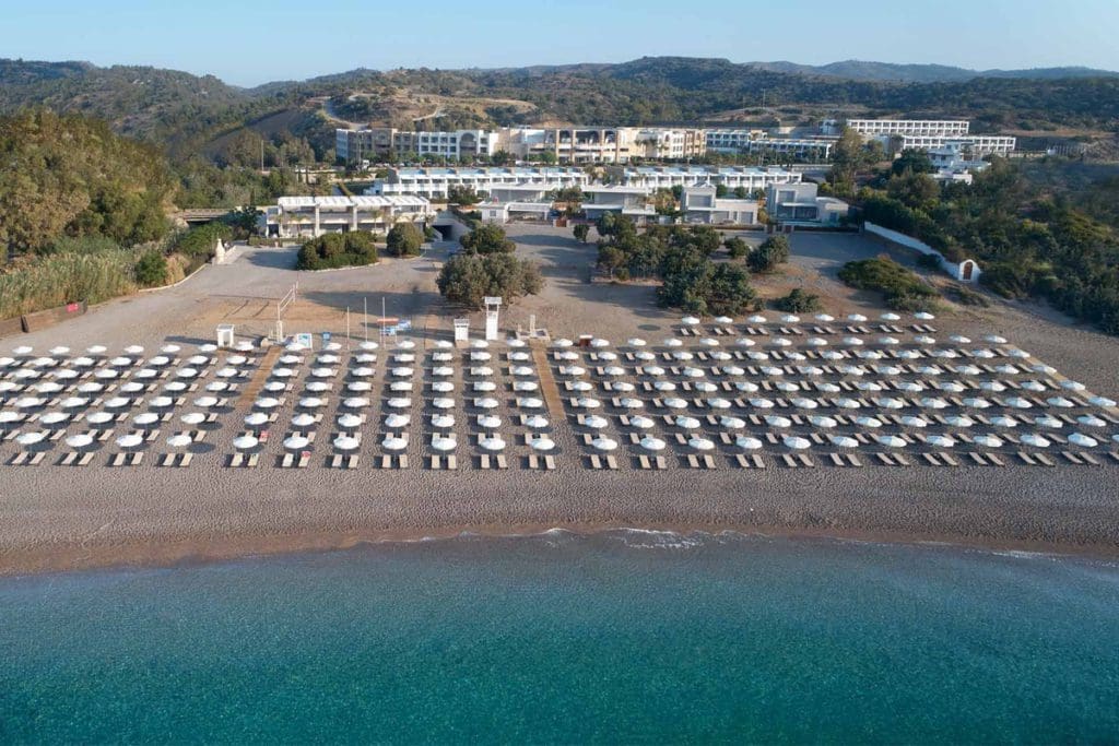 An aerial view of Princess Andriana Resort & Spa along the beach, one of the best all-inclusive hotels in Greece for families.