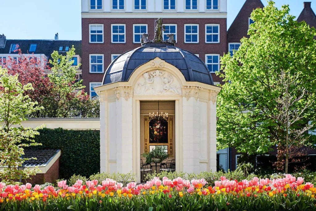 The exterior gardens of Waldorf Astoria Amsterdam, one of the best hotels in Amsterdam for families.
