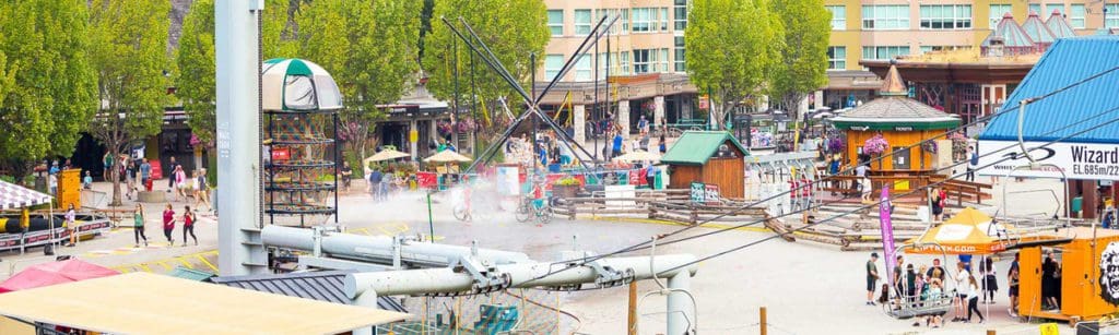 The outdoor splash zone at Family Adventure Zone on a sunny summer day.