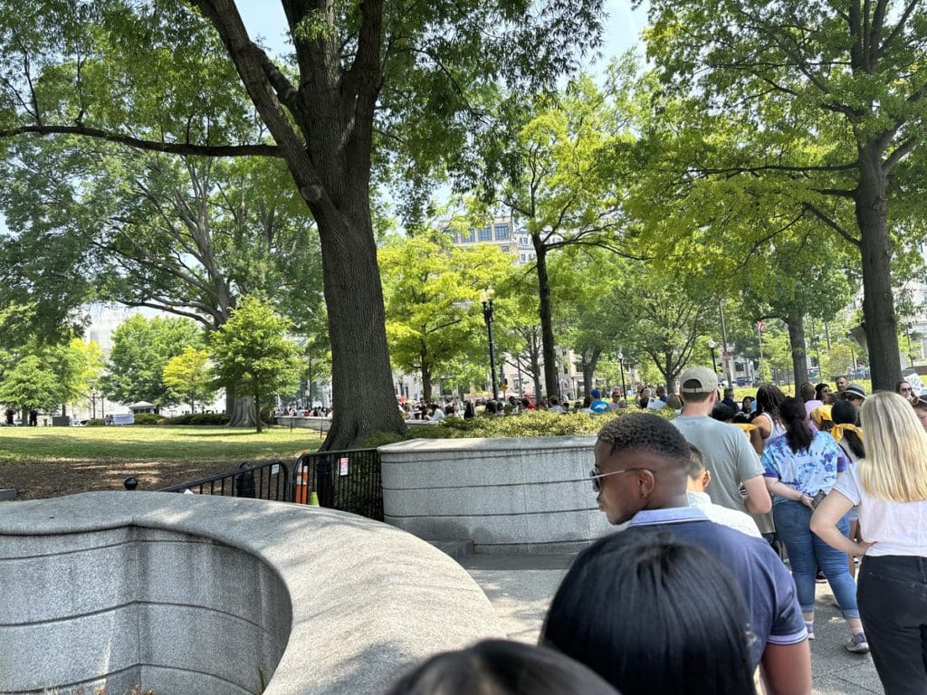 A long line of people awaiting a tour in Washington DC.