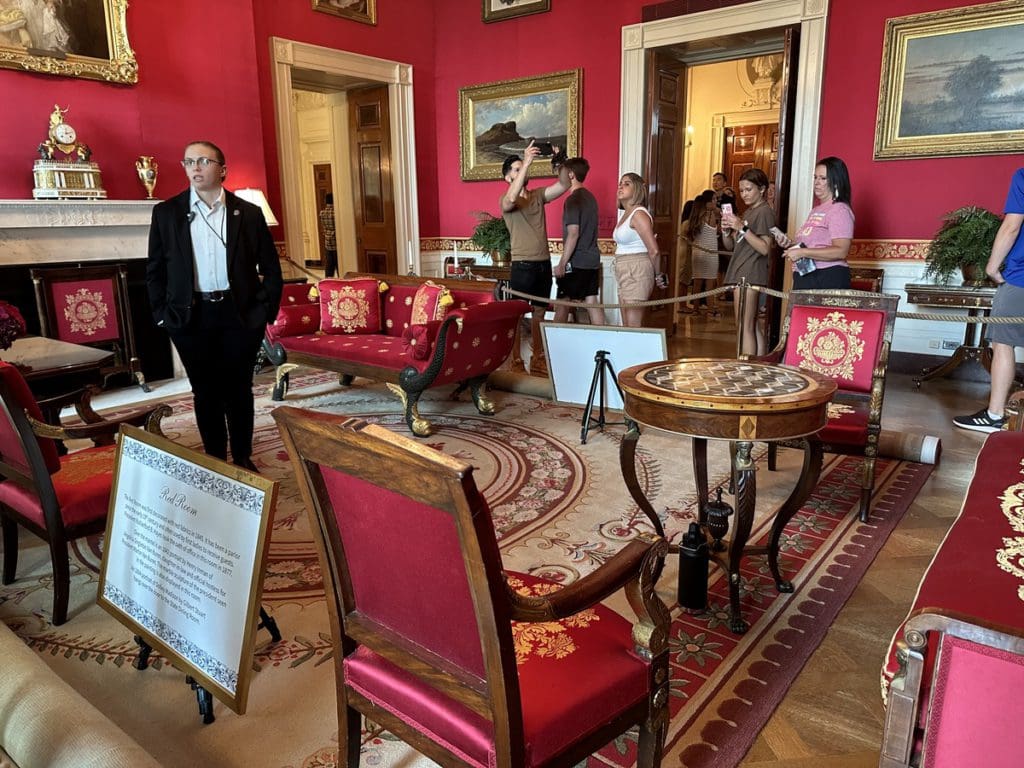 Inside an ornate room at the White House.