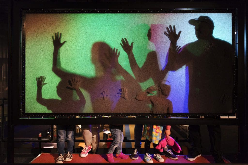 Kids play with a video screen display at Technorama Science Centre.