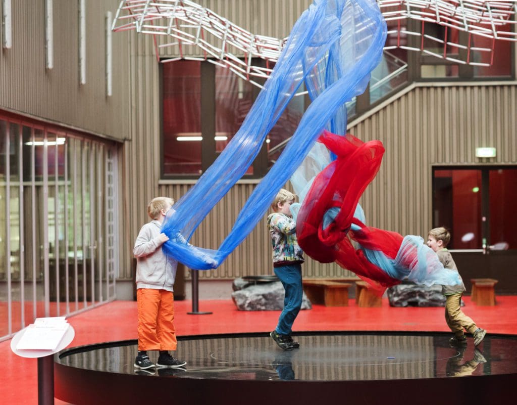 Kids play with an interactive display at Technorama Science Centre.