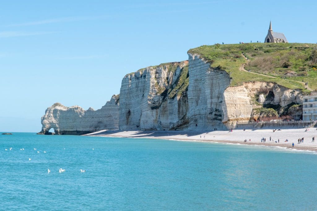 Cliffs of Etretat in Normandy, France, along the ocean.
