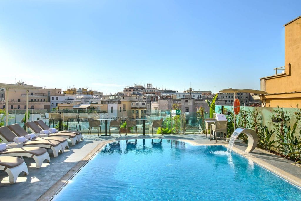 The rooftop pool on a sunny day at Aleph Rome Hotel, Curio Collection by Hilton.