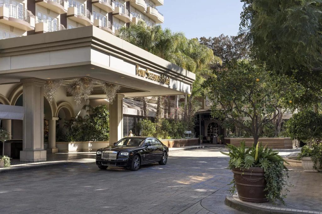 A car waits at the entrance of Four Seasons Hotel Los Angeles at Beverly Hills.