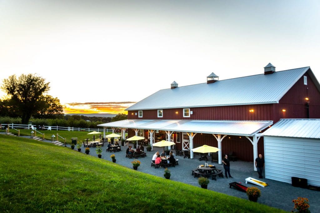 The barn at Pennings Orchard & Cidery, one of the best places to go apple picking near NYC with kids.