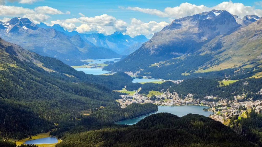 A sweeping view of a mountainous valley in Engadine, Switzerland.