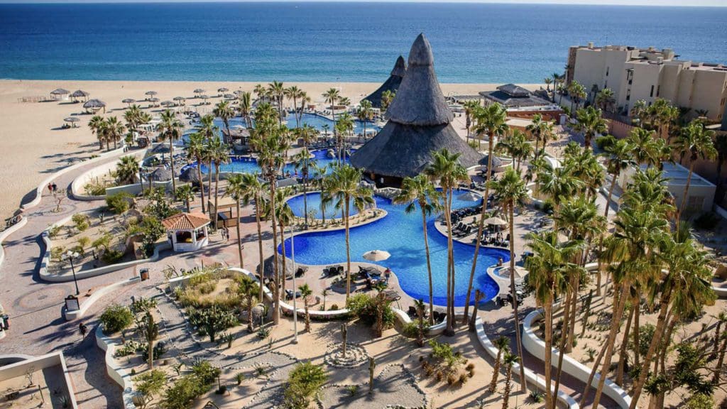 An aerial view of the pool and grounds at Sandos Finisterra, one of the best hotels in Mexico with large rooms for families.