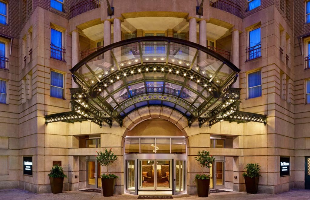 The grand entrance to The Westin Georgetown, Washington DC at night.