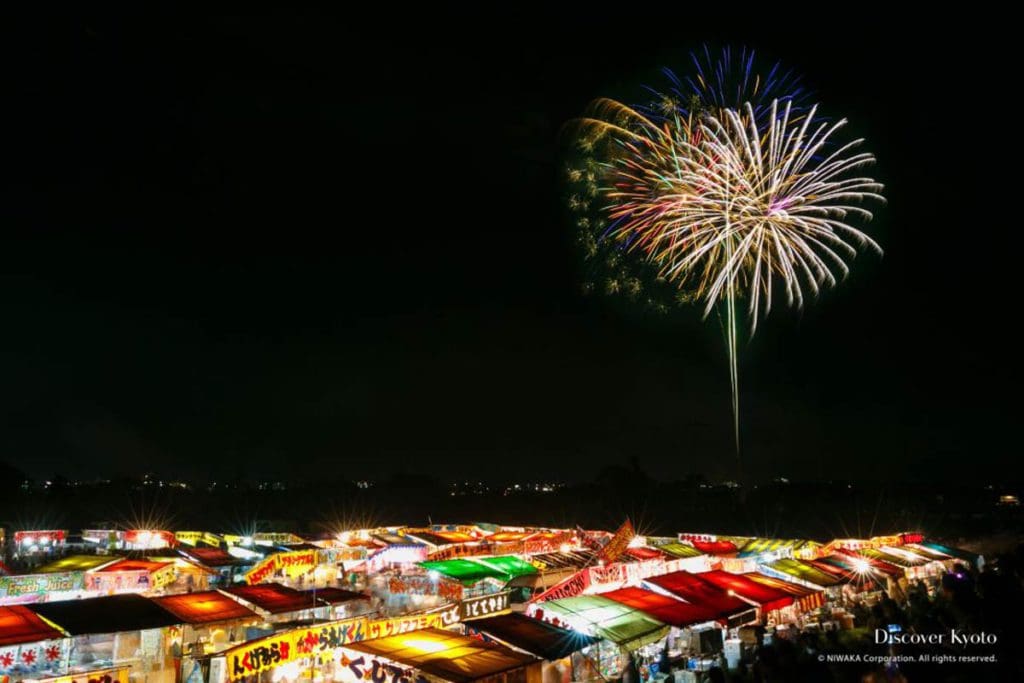 Fireworks over Kyoto for the new year, one of the best destinations for New Year's with kids.