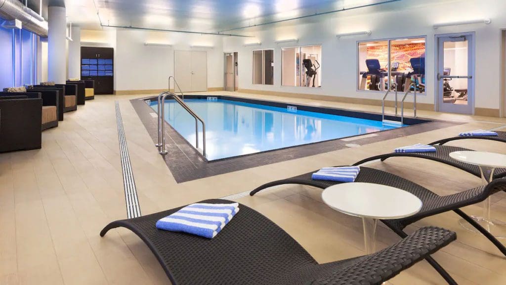 The indoor pool area and surrounding pool deck at Hyatt Regency Bloomington-Minneapolis.