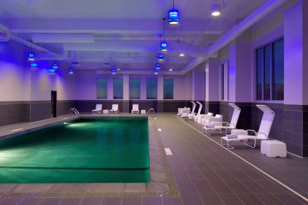 Indoor pool and pool loungers at Radisson Blu Mall of America.