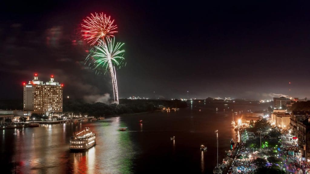 A fireworks show over the Savannah waterfront on New Year's Eve. It's one of the best places to celebrate the New Year on the East Coast.