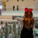 A young girl looks down on a holiday display at the Mall of America.