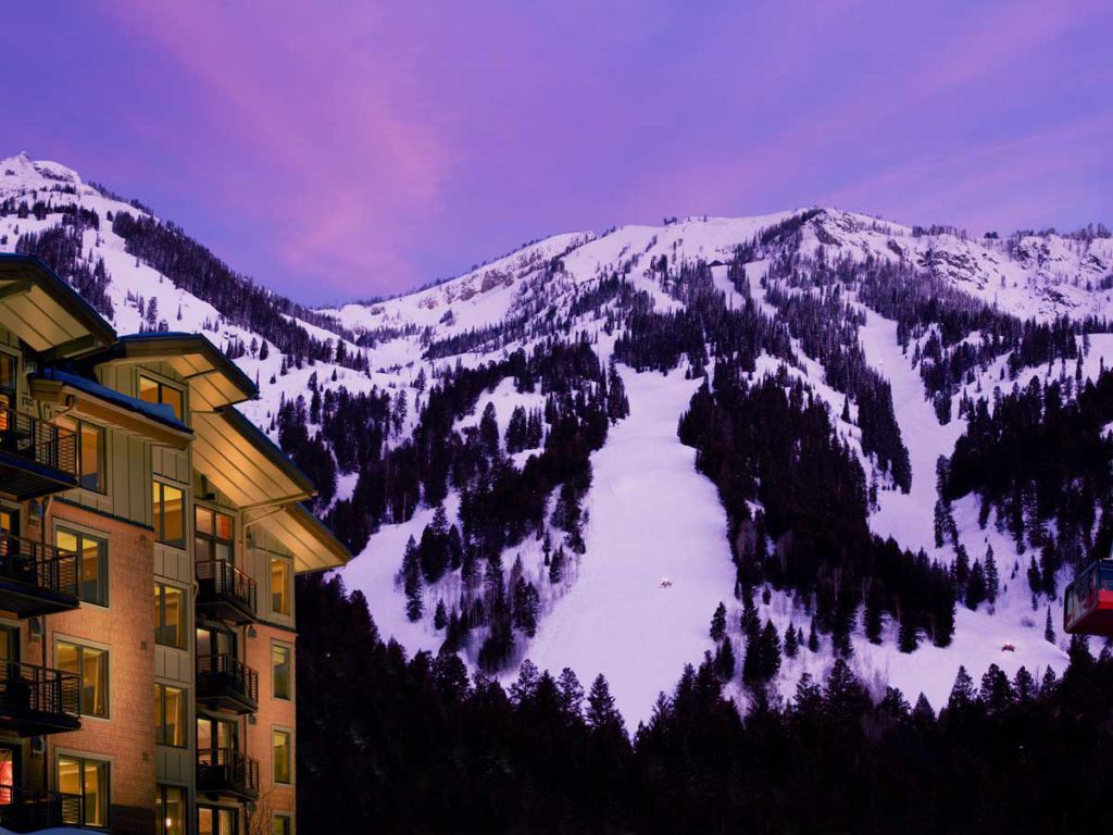 A view of Hotel Terra Jackson Hole with the mountains in the background