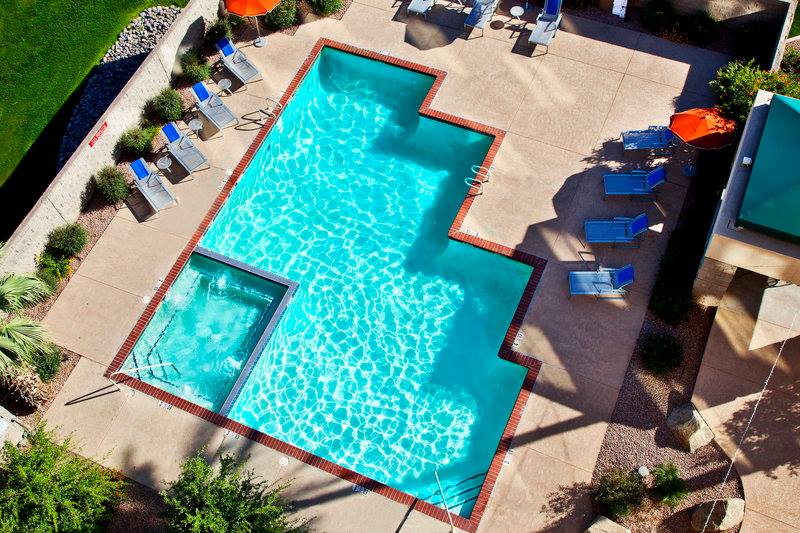 An aerial shot of the outdoor pool at the Radisson Hotel Phoenix Airport, one of the best places to stay on a Phoenix itinerary for families. 