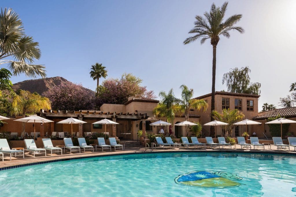 A view of the outdoor pool surrounded by lounge chairs at the Royal Palms Resort and Spa in Phoenix