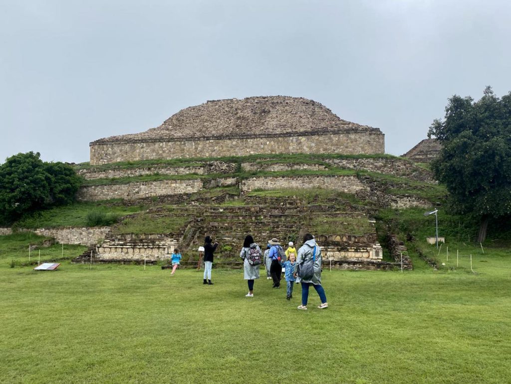 A family exploring the ruins at Monte Alban near Oaxaca.