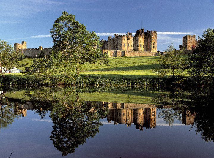 A view of Alnwick Castle in Alnwick, England, one of the best Harry Potter destinations to visit with kids.