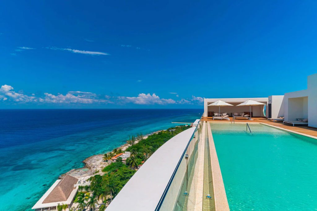 The outdoor, oceanfront pool at The Westin Cozumel, one of the best Marriott hotels in Mexico for families.