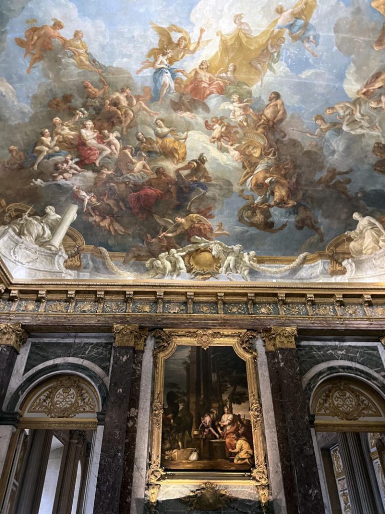 One of the artworks inside the Palace of Versailles near Paris, one of the best places to visit on a Paris itinerary with preteens or teens.