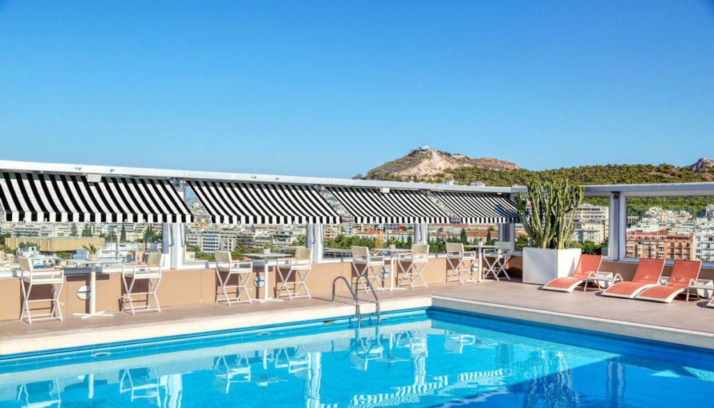 The outdoor pool at the Divani Caravel, one of the best hotels in Athens for families.